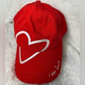 PEACELOVEWORLD Woman’s Red I AM LOVE baseball cap.